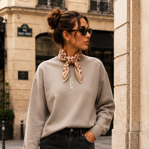 Woman in a stylish outfit walking on a city street